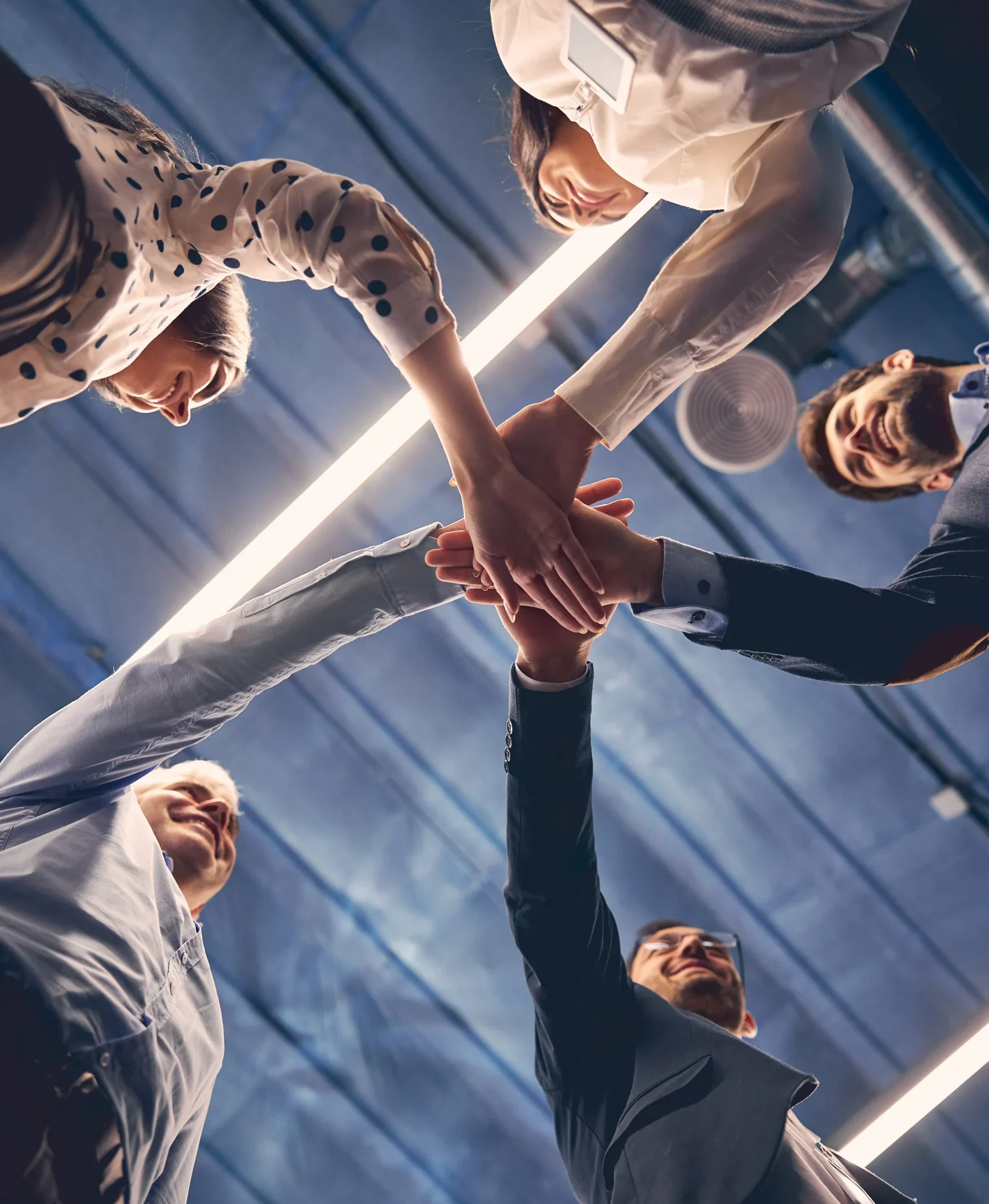 group-of-executive-placing-their-hands-together-2026-01-09-06-20-04-utc